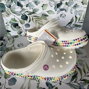 NWT crocs with colorful glitter heart border